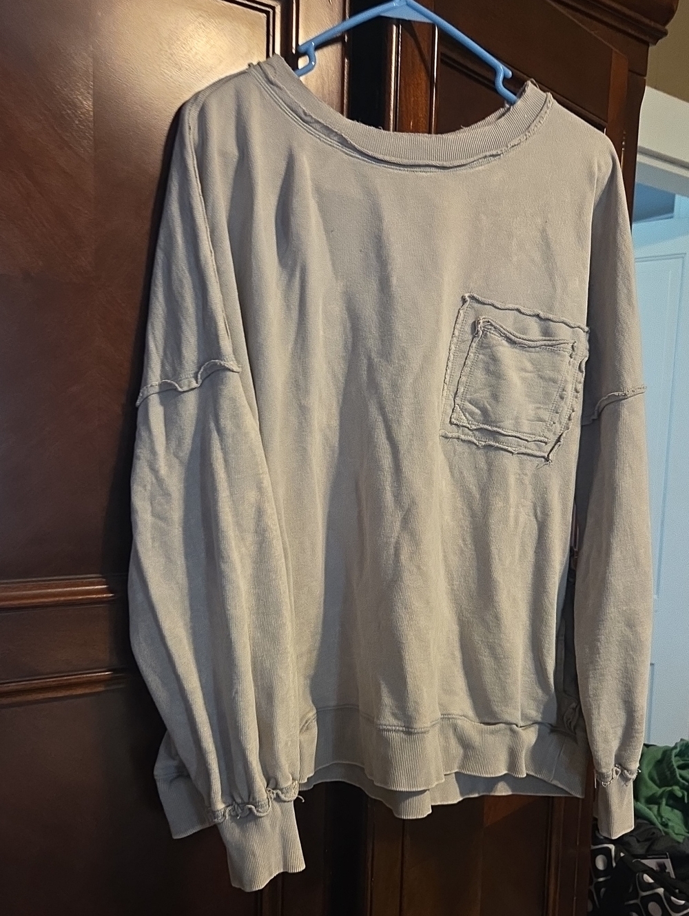 Washed Light Gray Pullover Sweatshirt with Raw-Edge Pocket